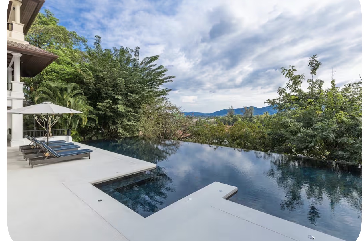 Infinity pool overlooking jungle and mountains at the Phuket villa